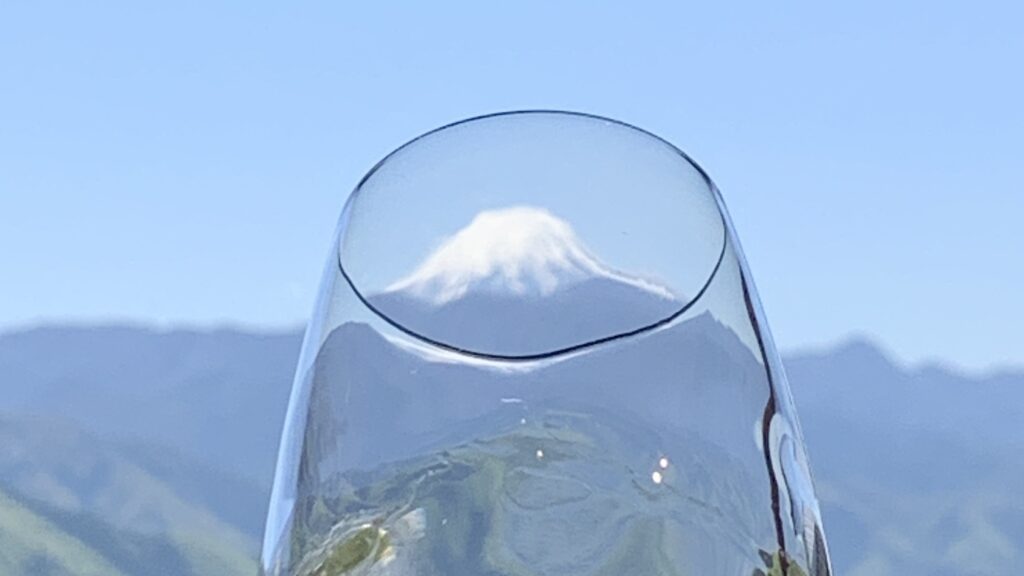 Mount Fuji seen through a wine glass